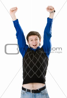 Young man screaming with his fists in the air