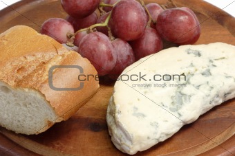 Mold cheese with grapes