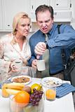 Late for Work Stressed Couple Checking Time in Kitchen.