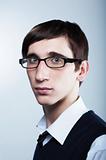 cute young guy with fashion haircut wearing glasses