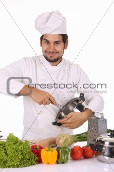 young chef preparing lunch 