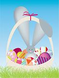 Easter bunny with eggs in basket