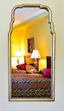 Bedroom interior reflected in mirror