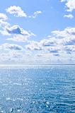 Blue water and sunny sky background