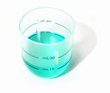 Measuring glass with blue liquid