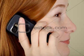 Woman speaks on the mobile phone