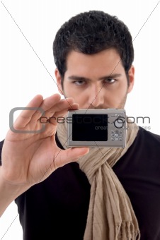 young man holding digital camera