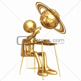 Golden Student With A Planet Above School Desk