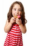 Young girl eating doughnut