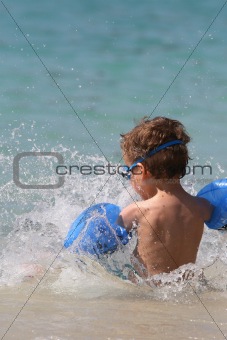 Young boy in the sea