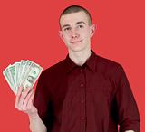 Young man with pack of dollars