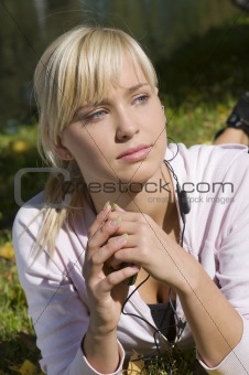 blond girl with earphone