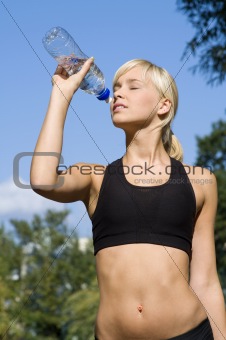 sporting girl drinking