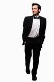Man in tuxedo stepping out