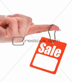 hand holding sale tag