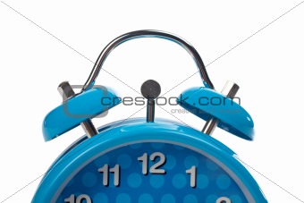 Partial view of blue alarm clock