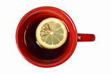 Red cup of tea with lemon