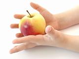 hands with apple