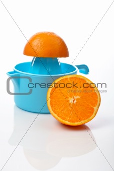 Squeezer and two half orange