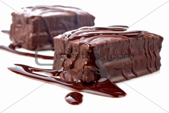 Two chocolate cakes with syrup