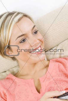 blond girl on sofa