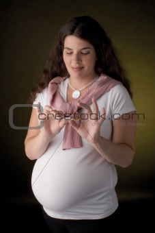 Pregnant women holding a cigarette
