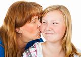 Mom Kisses Teen Daughter