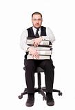 Man with binders sitting on a chair