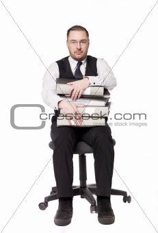 Man with binders sitting on a chair