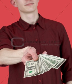 Man with pack of dollars