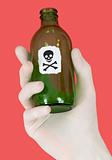 Green bottle with skull and crossbones