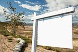 Blank Real Estate Sign and Empty Construction Lots - Ready for your own message.