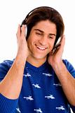 portrait of smiling man listening music