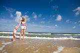 mum and child on the seashore
