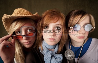 Three Young Girls with Microphone