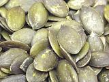 A lot of pumpkin seeds in a close-up view
