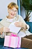 Old woman opening present