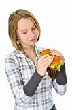 Teenage girl holding big hamburger