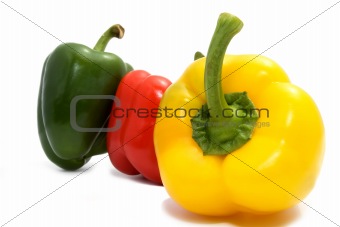 three different color peppers