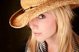 Pretty blonde teenager in a cowboy hat