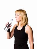 Work-out girl drinking water