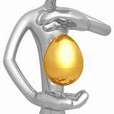 Gold Nest Egg Hovering Between Hands