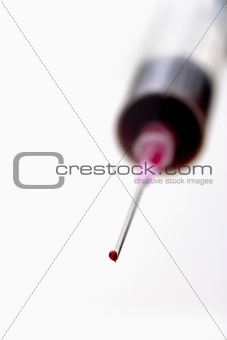 Syringe on table