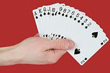 Playing cards on hands
