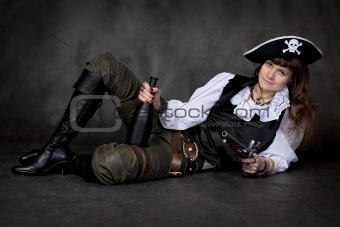 Girl - pirate with pistol and bottle