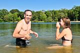 Family splashing in lake