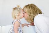 Mother Kissing Daughter