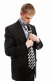 Putting on necktie