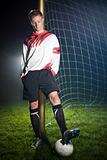 soccer player in the dark