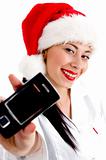 woman wearing christmas hat and showing mobile